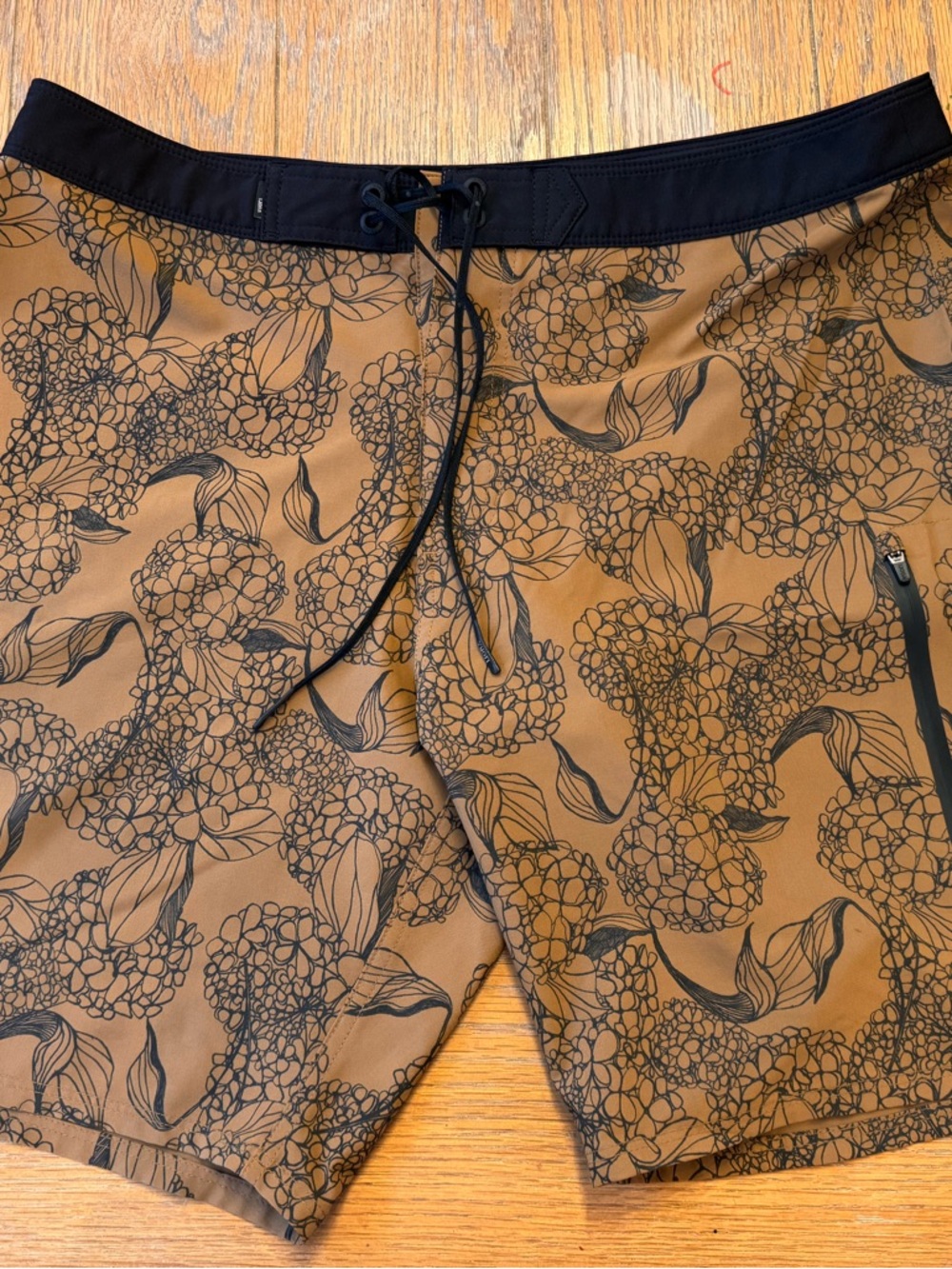 Vuori Tan Floral Board Shorts with Black Waistband